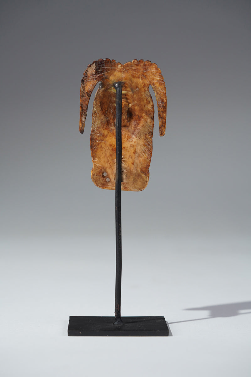 A Benin bone pendant