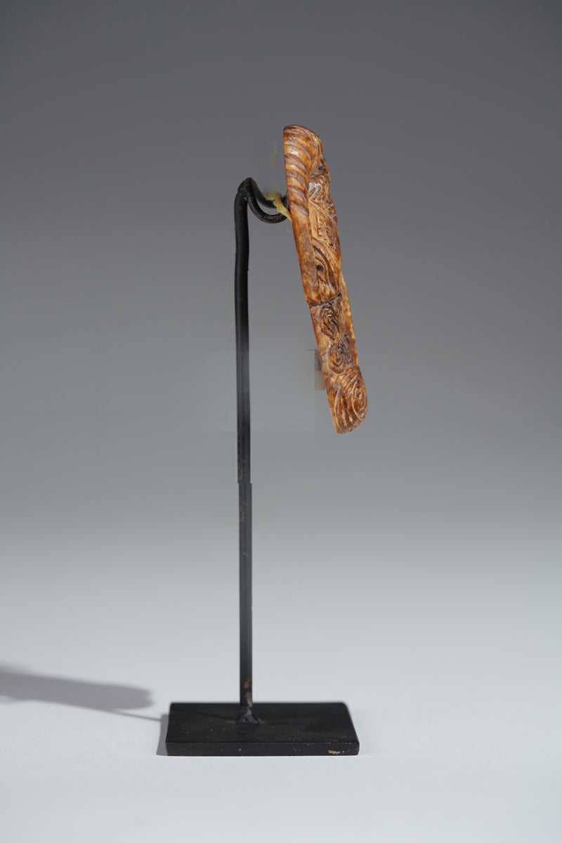 A Benin bone pendant