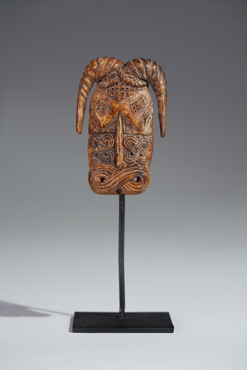 A Benin bone pendant