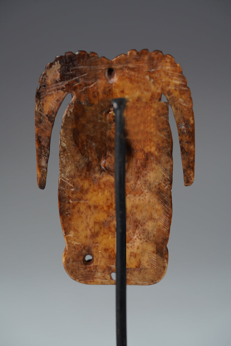 A Benin bone pendant