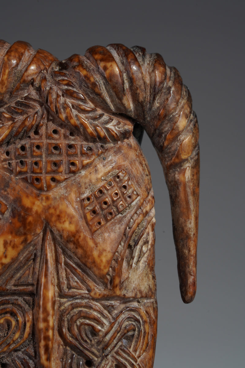 A Benin bone pendant