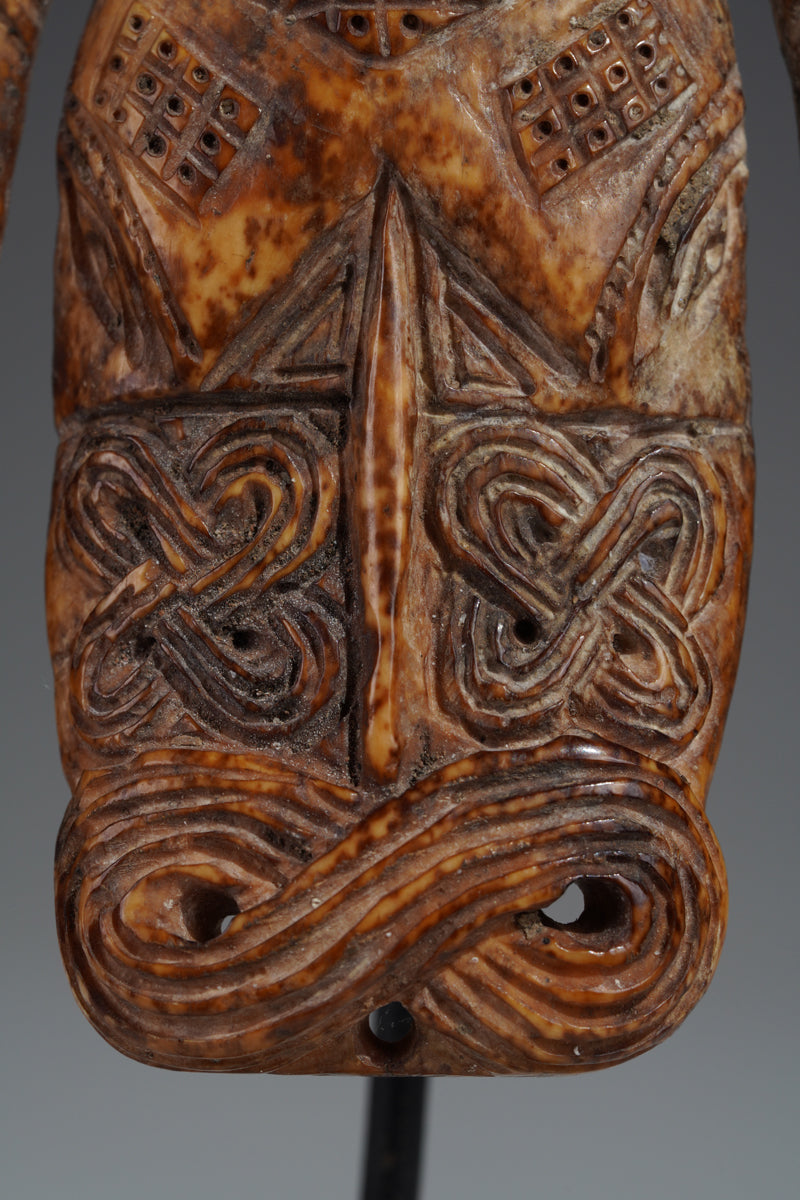 A Benin bone pendant