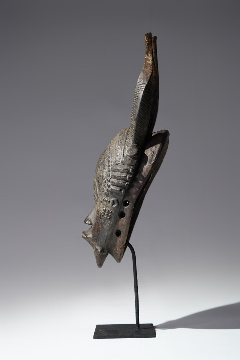A horned Baule mask