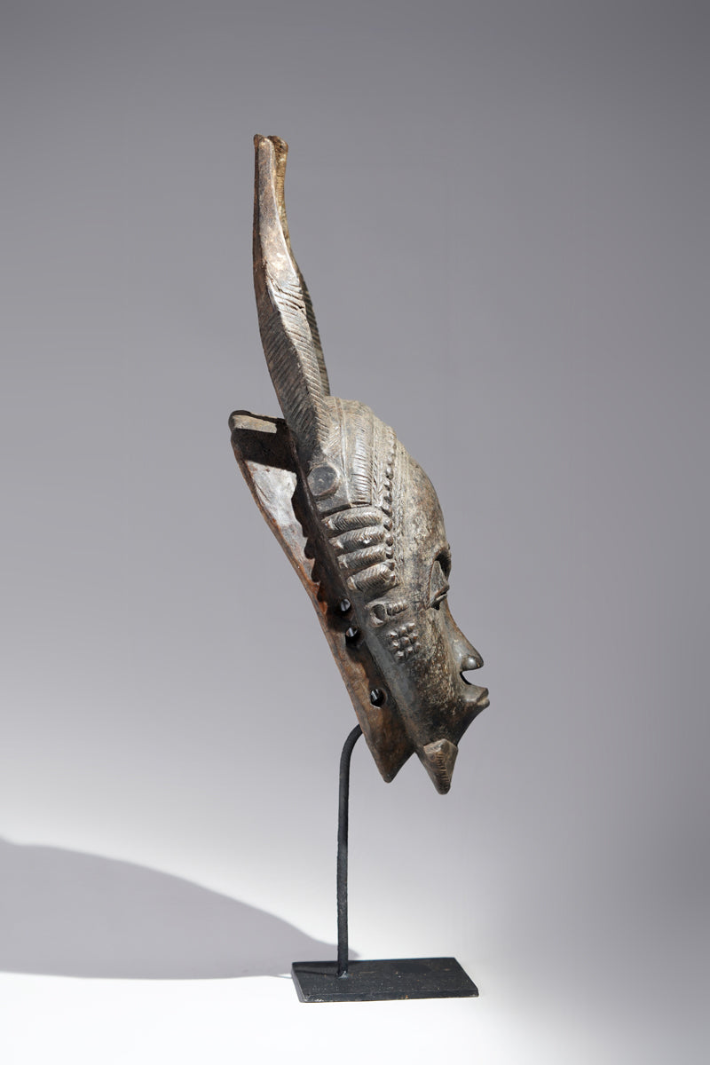 A horned Baule mask