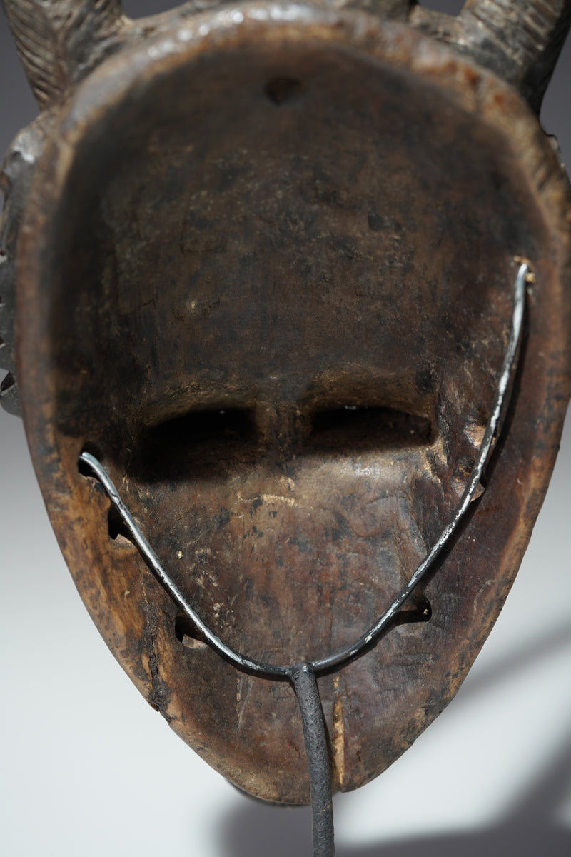 A horned Baule mask