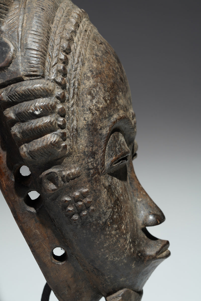 A horned Baule mask