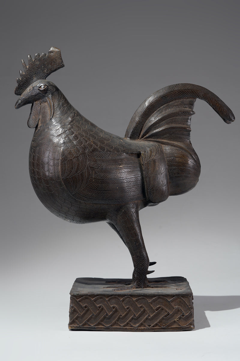 A brass rooster in the style of Benin, Ọkpa