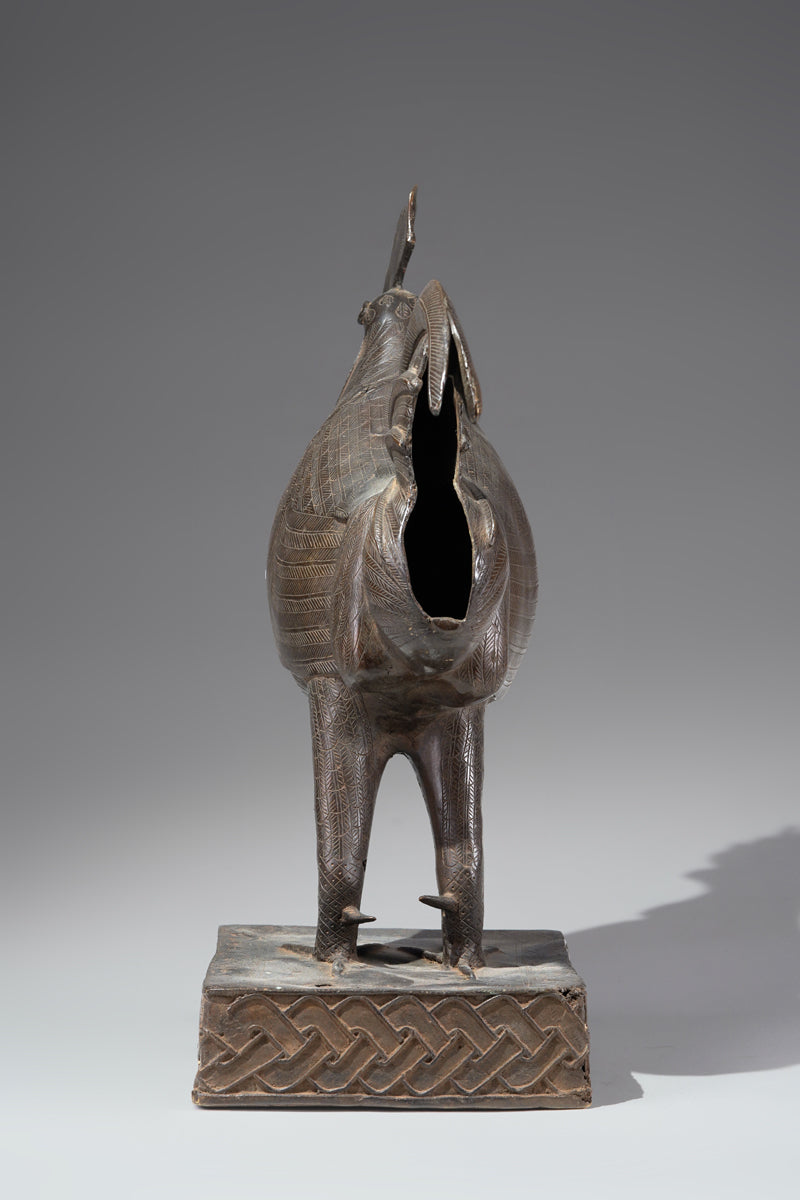 A brass rooster in the style of Benin, Ọkpa