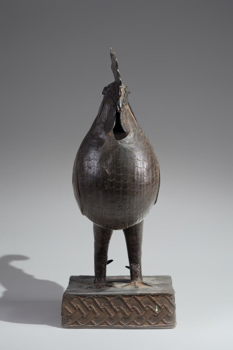 A brass rooster in the style of Benin, Ọkpa
