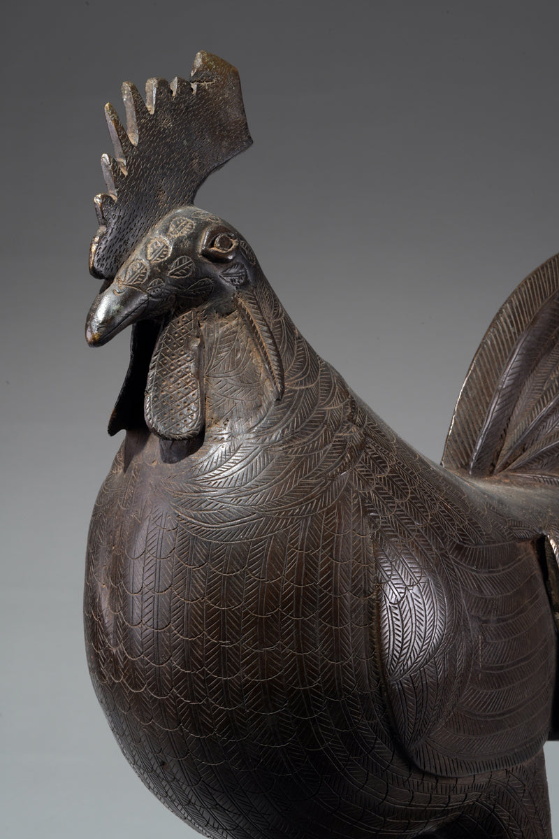 A brass rooster in the style of Benin, Ọkpa