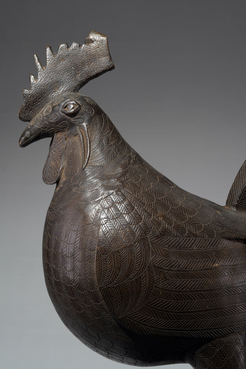 A brass rooster in the style of Benin, Ọkpa