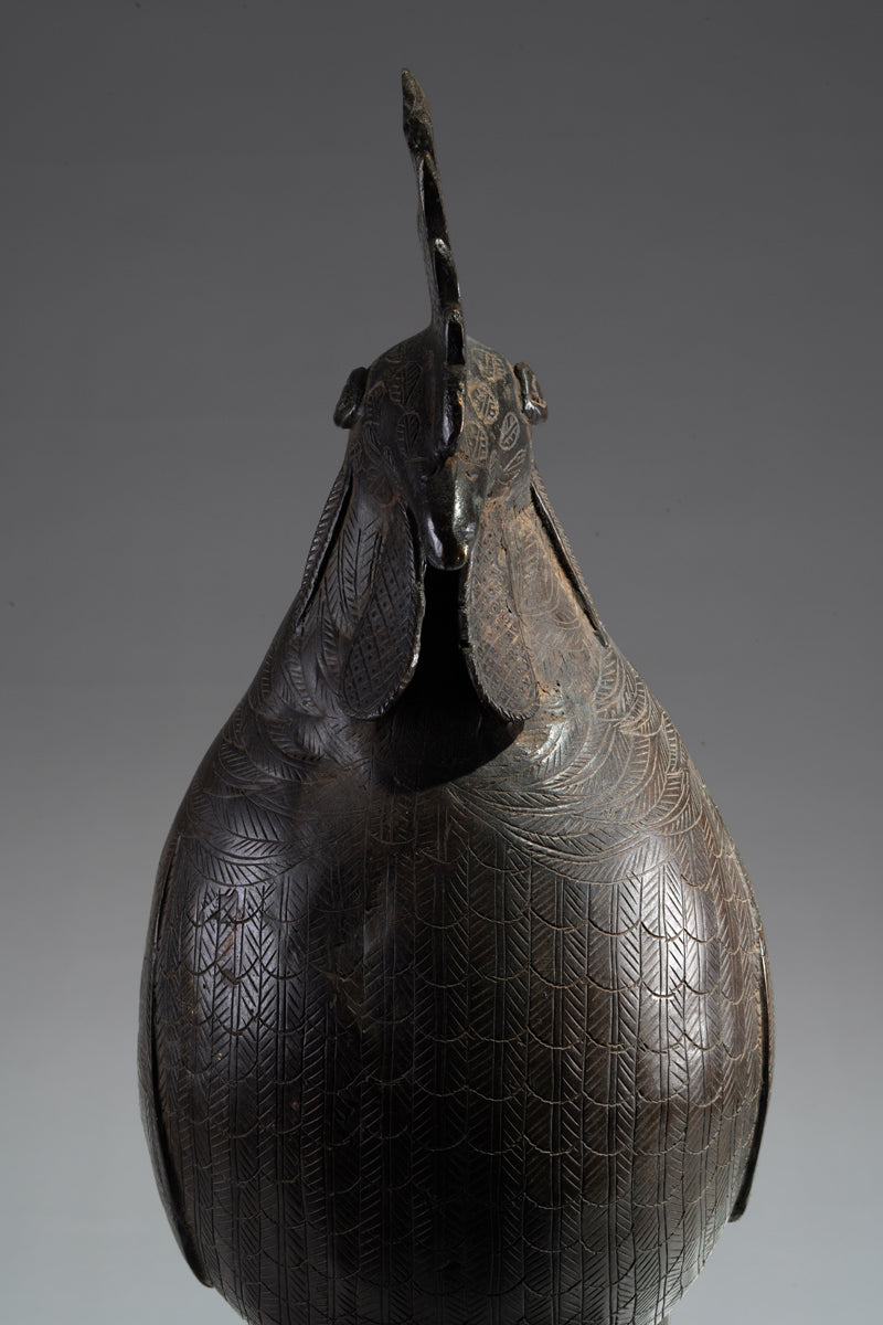 A brass rooster in the style of Benin, Ọkpa