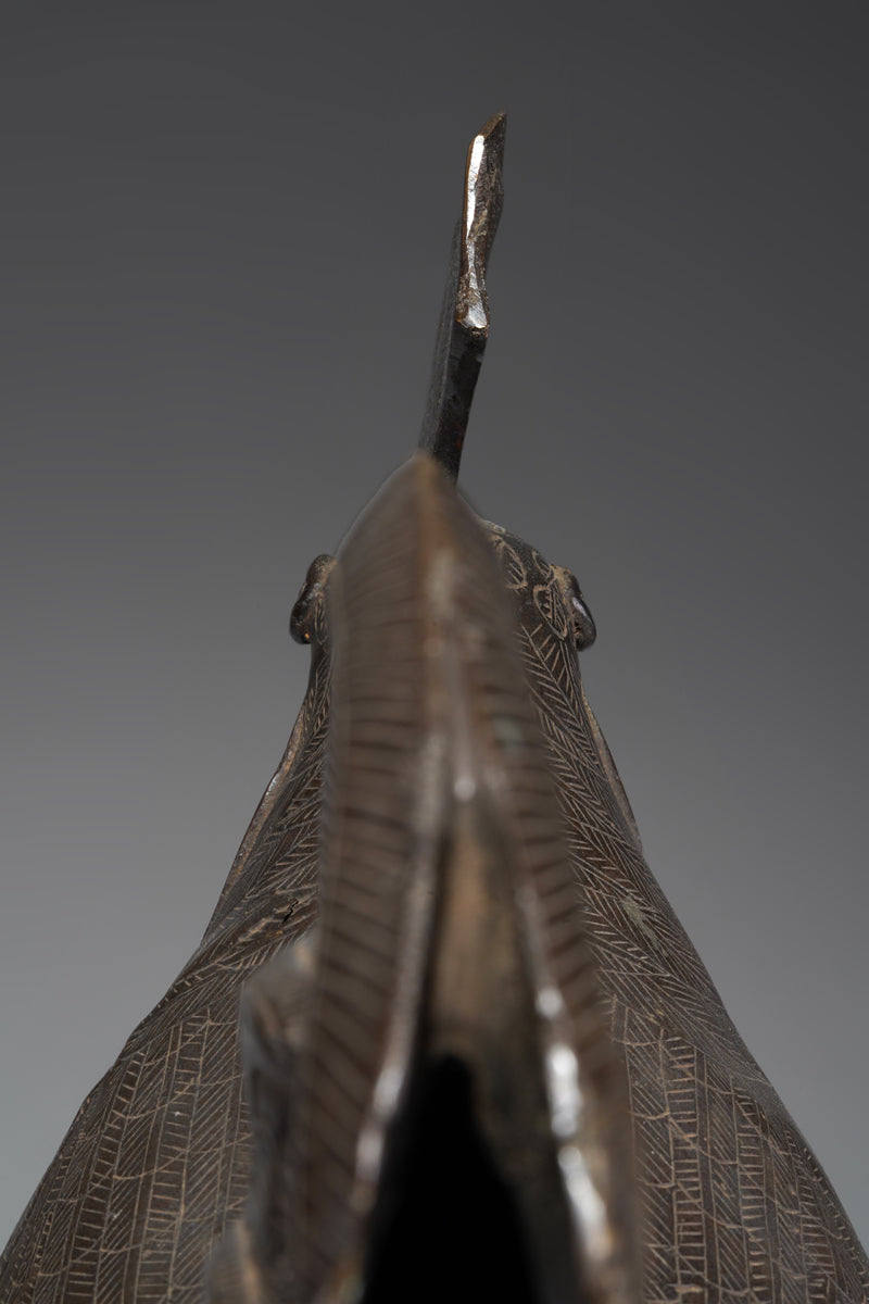 A brass rooster in the style of Benin, Ọkpa