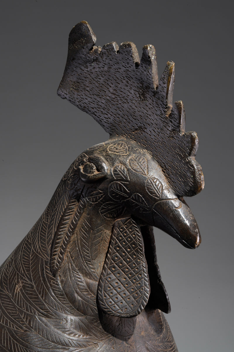 A brass rooster in the style of Benin, Ọkpa