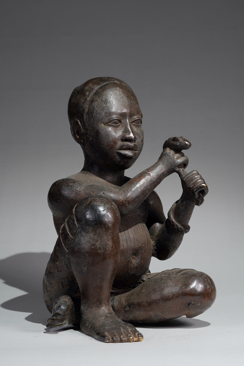 An Ife style bronze of the seated figure of Tada