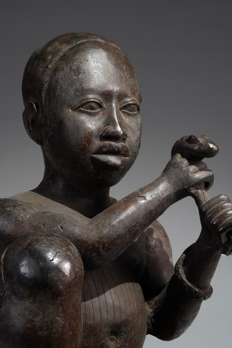 An Ife style bronze of the seated figure of Tada