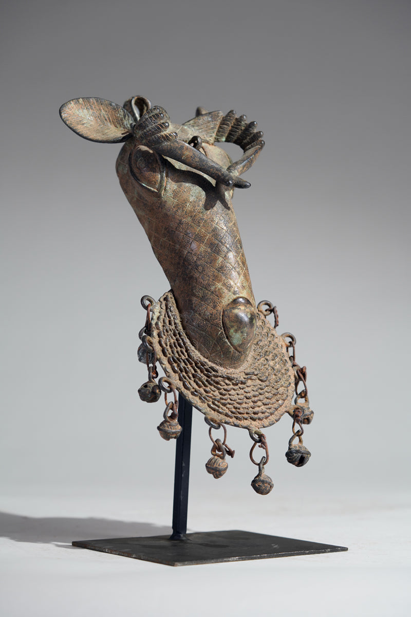 The present s bronze ram head