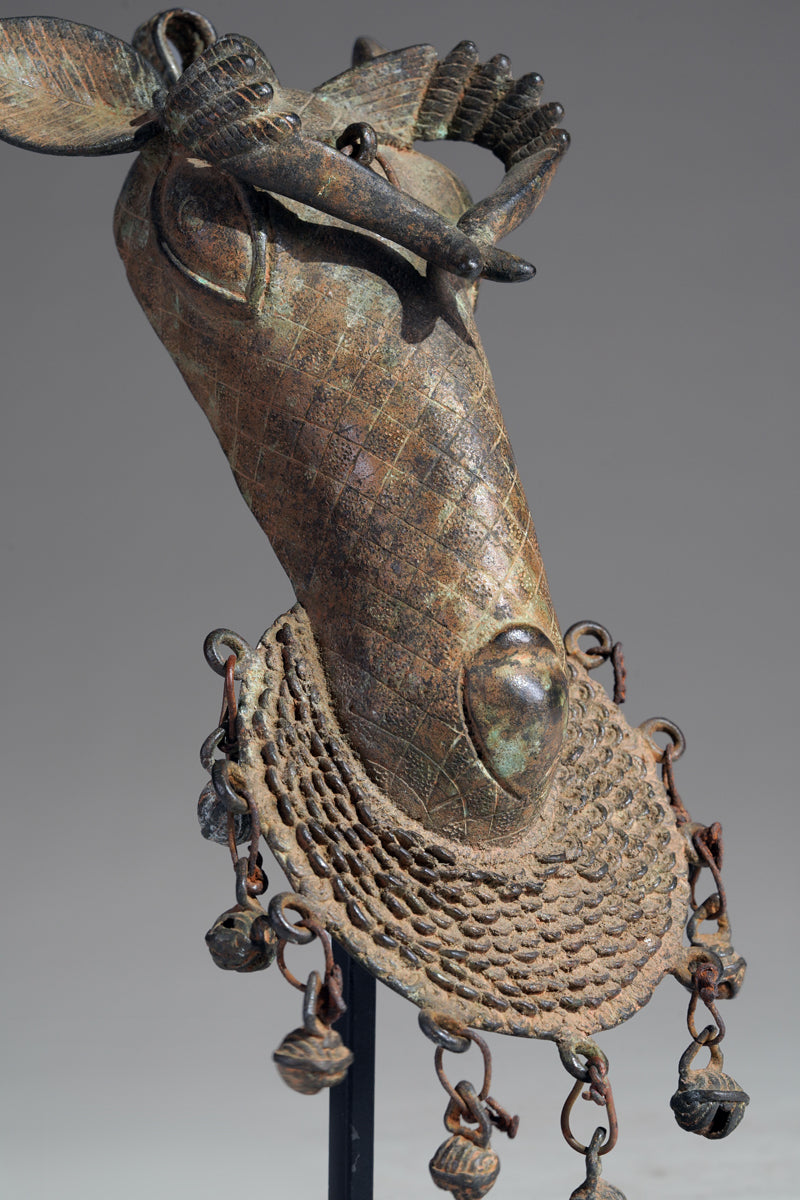 The present s bronze ram head