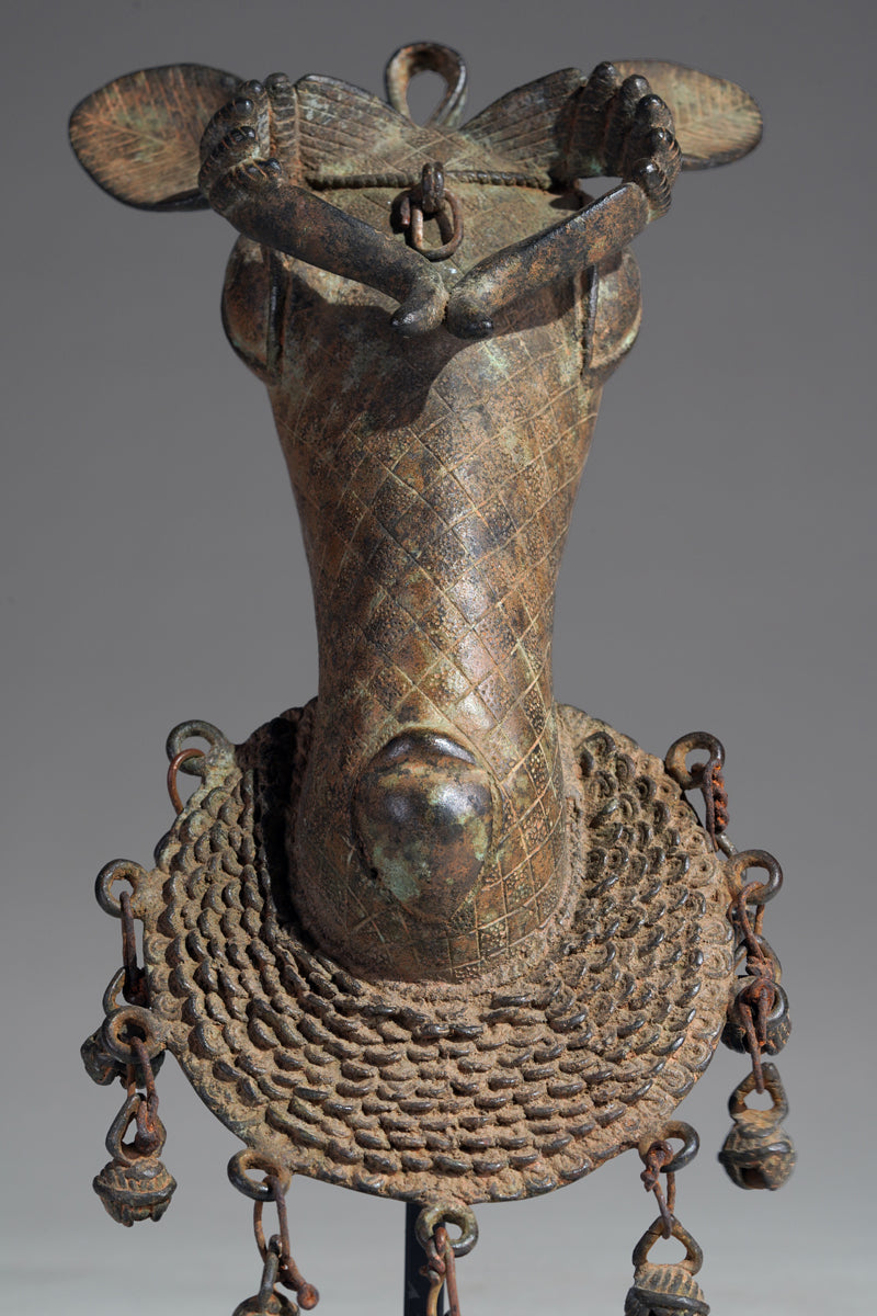 The present s bronze ram head