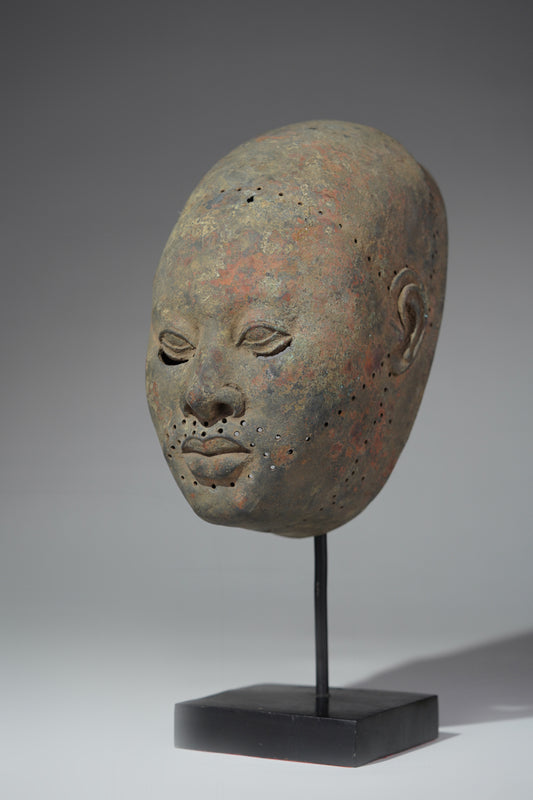 A funeral mask in the style of Ife