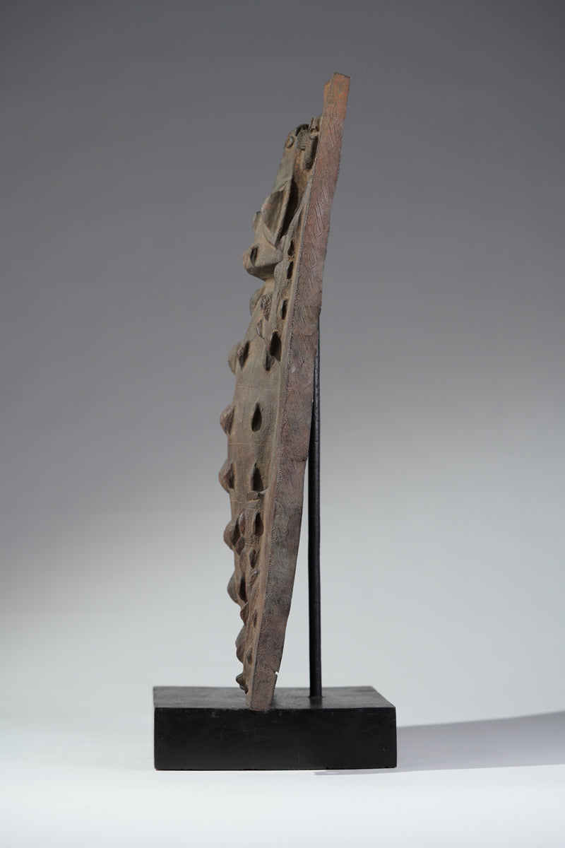This fragmentary Benin Bronze plate