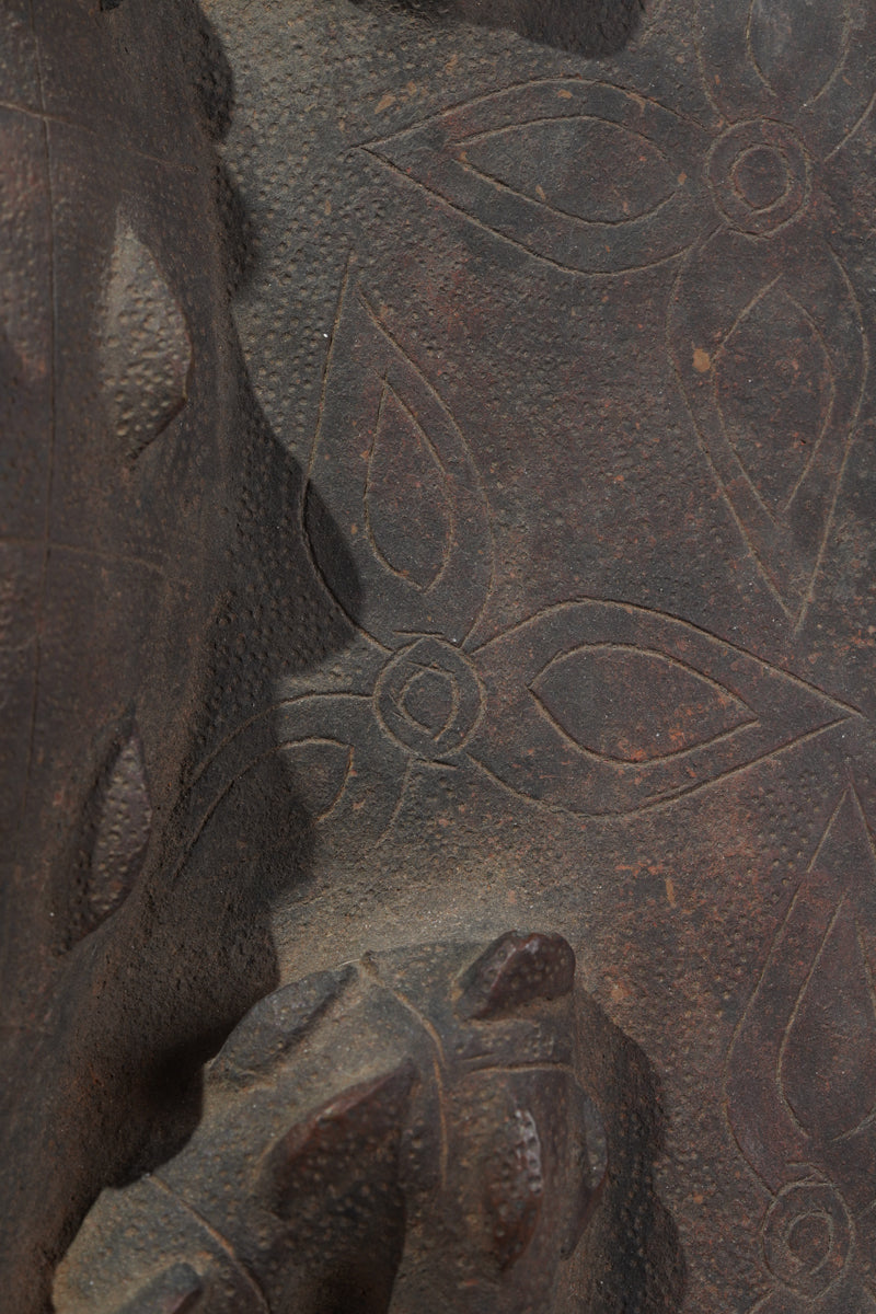 This fragmentary Benin Bronze plate