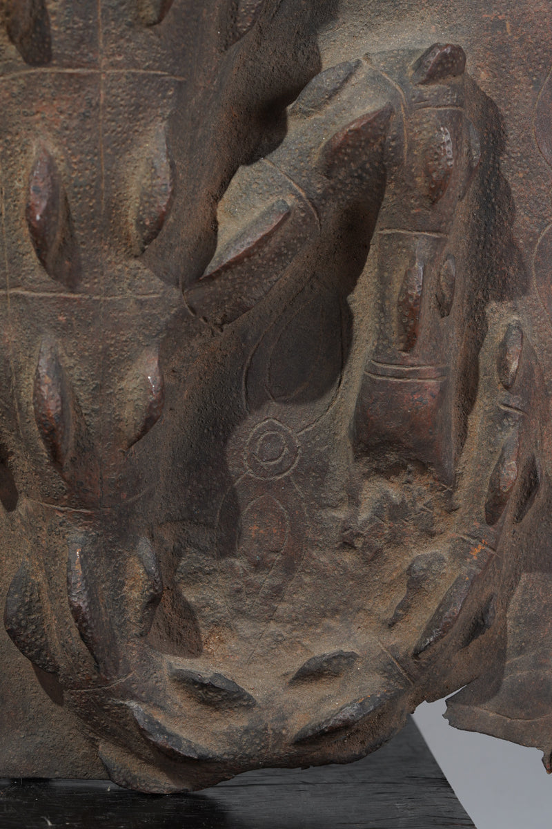This fragmentary Benin Bronze plate