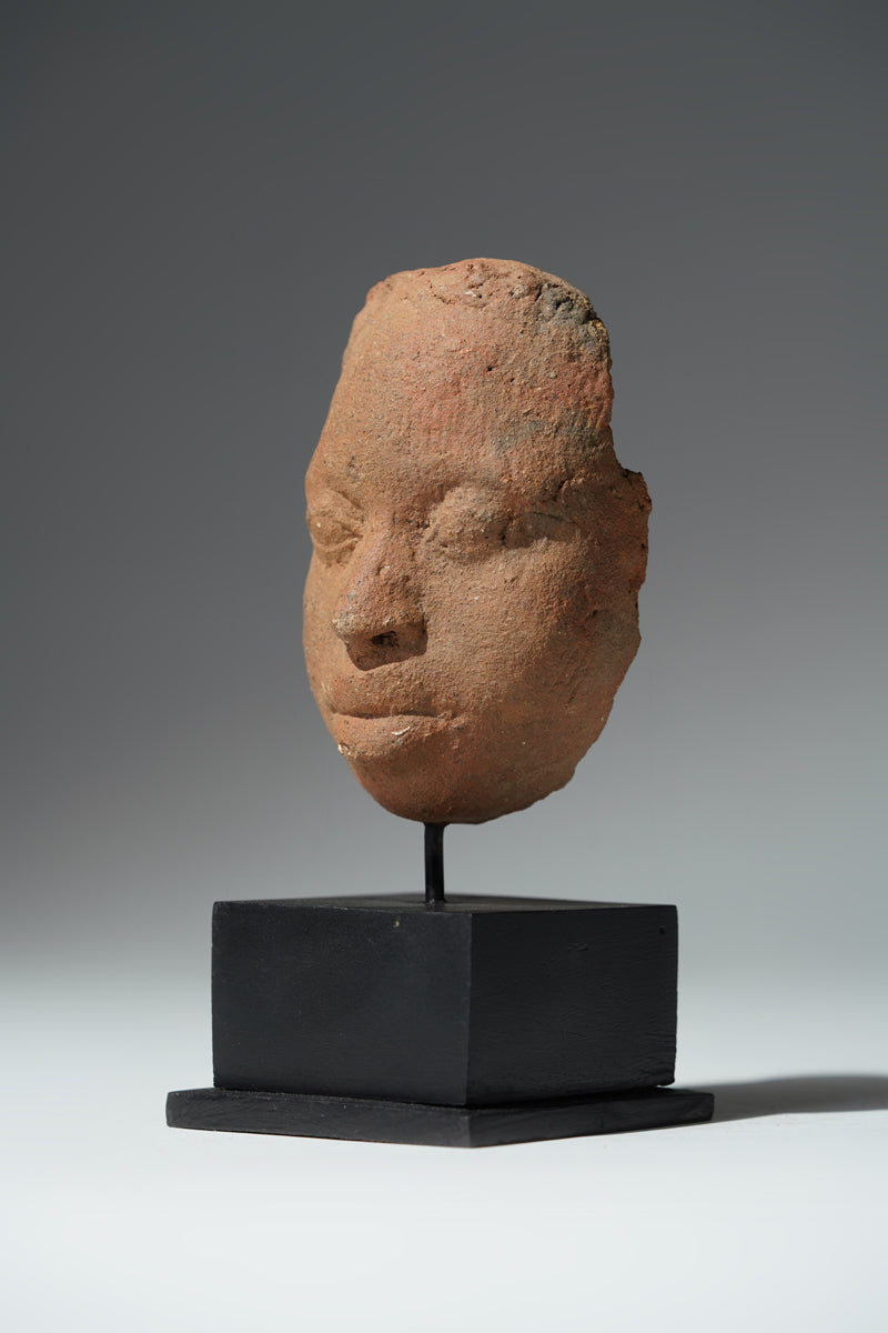 The fragment of a terracotta head from Ife