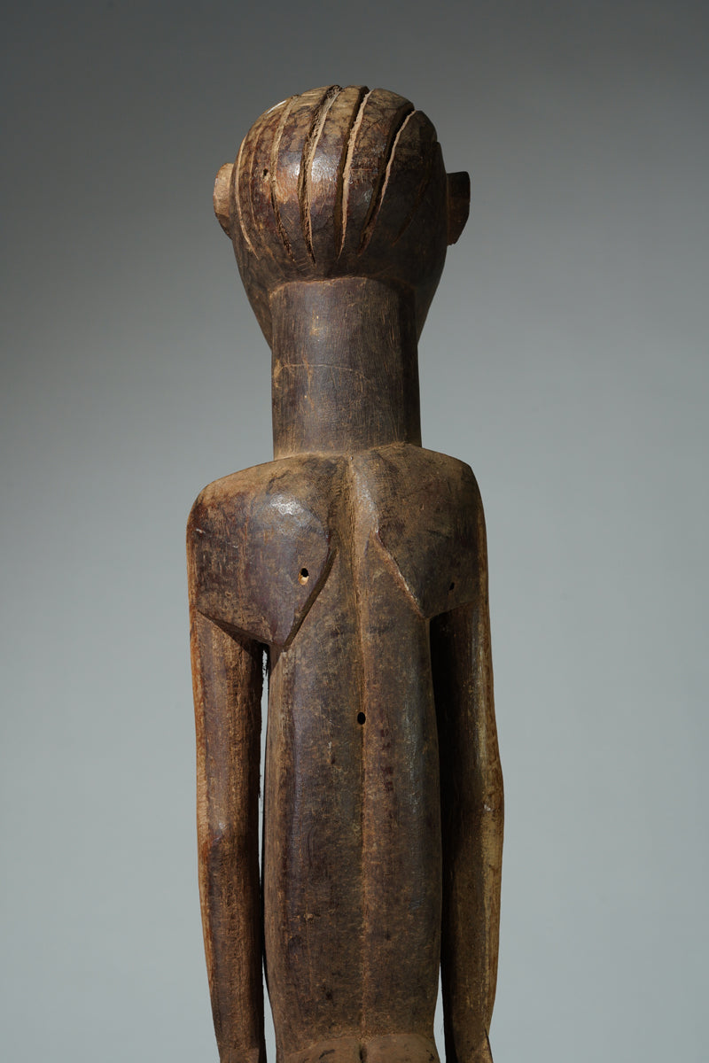A male sculpture attributed to Bimtiote Dah