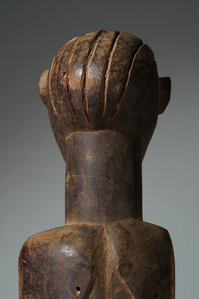 A male sculpture attributed to Bimtiote Dah