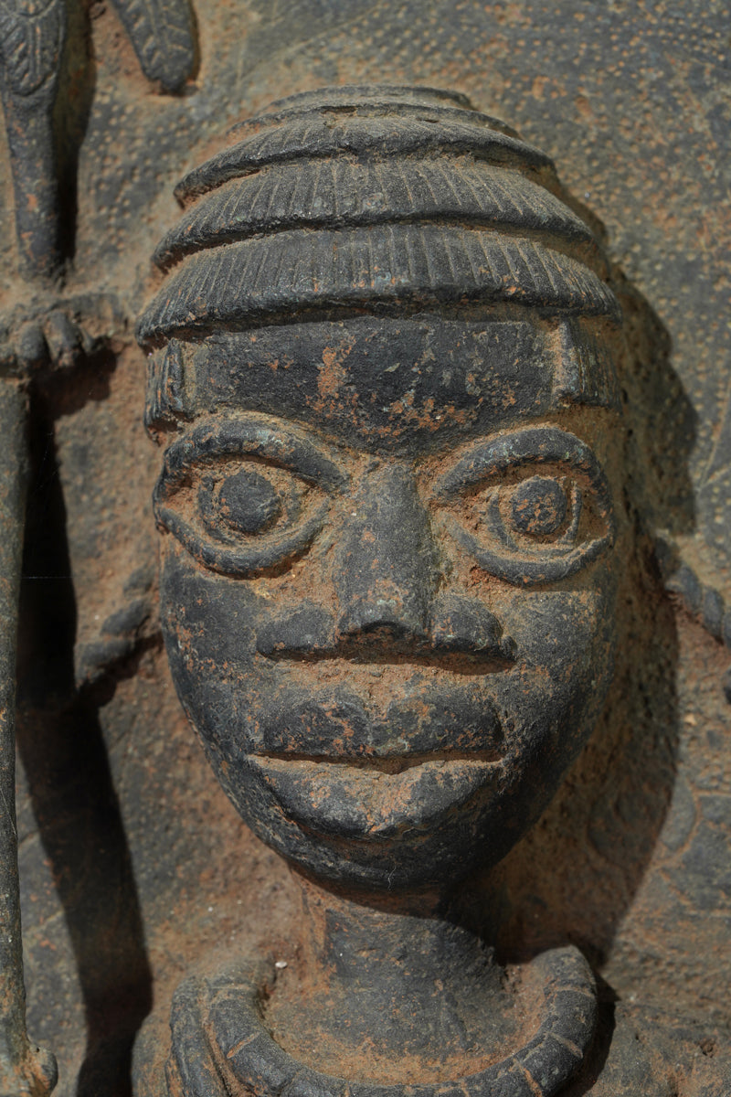 This Benin plaque depicts