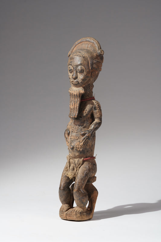 A male Baule sculpture