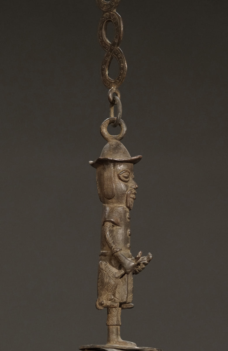A Benin bronze oil lamp