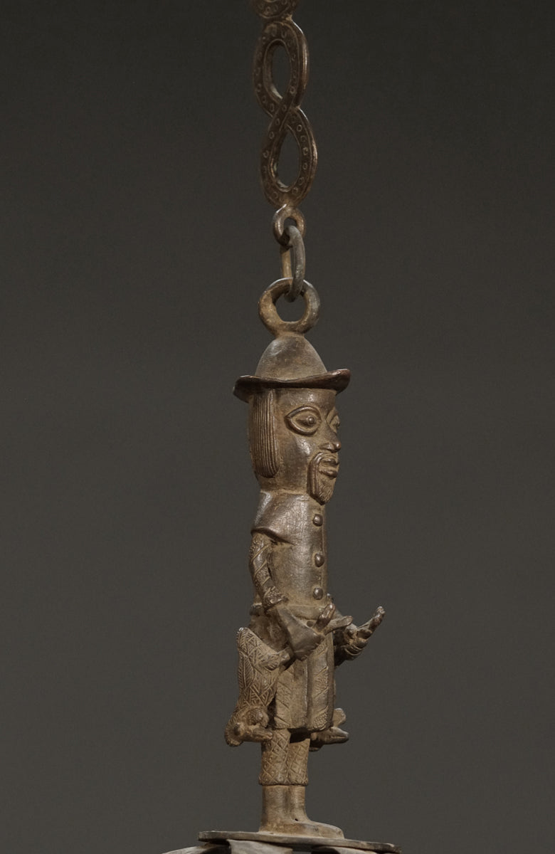 A Benin bronze oil lamp