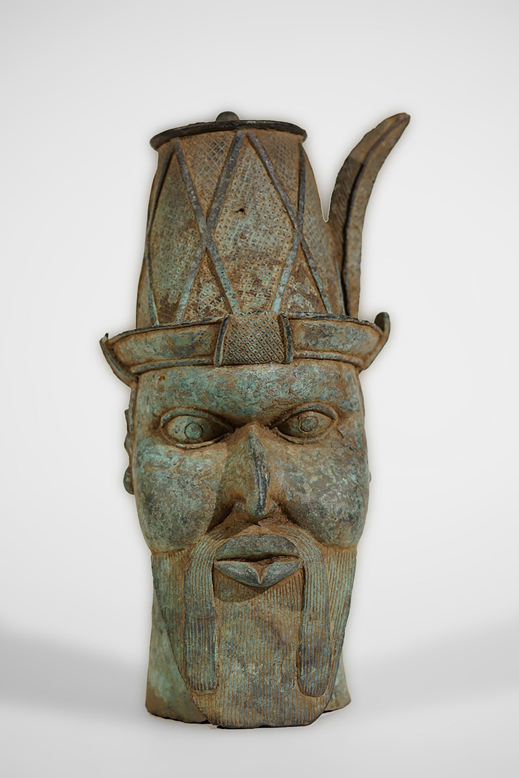 A Benin Bronze Head of a Portuguese