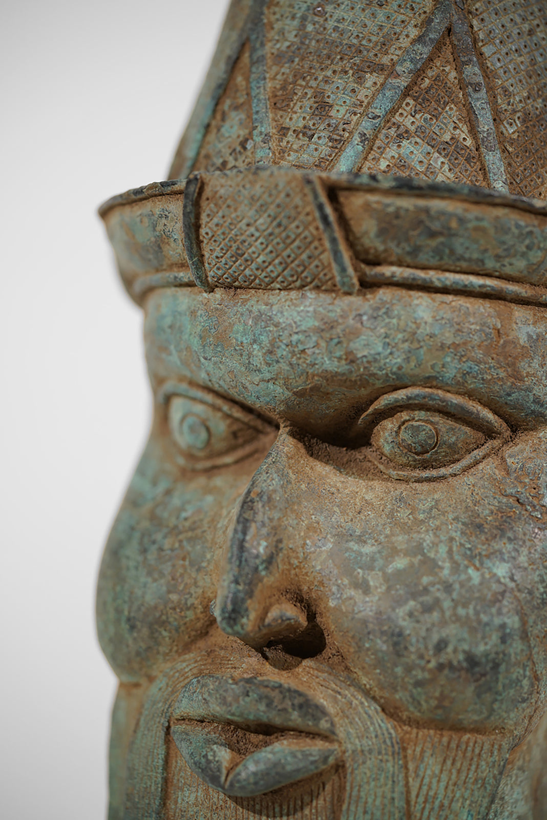 A Benin Bronze Head of a Portuguese
