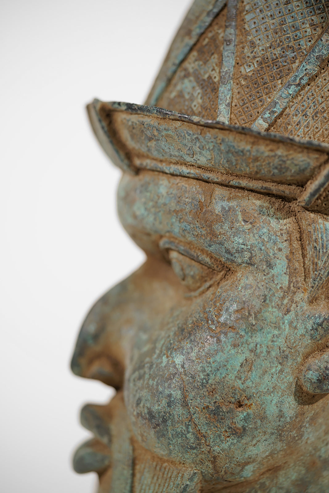 A Benin Bronze Head of a Portuguese