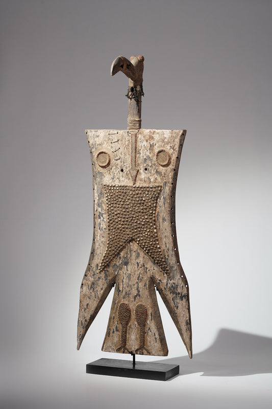A Toussian plank mask