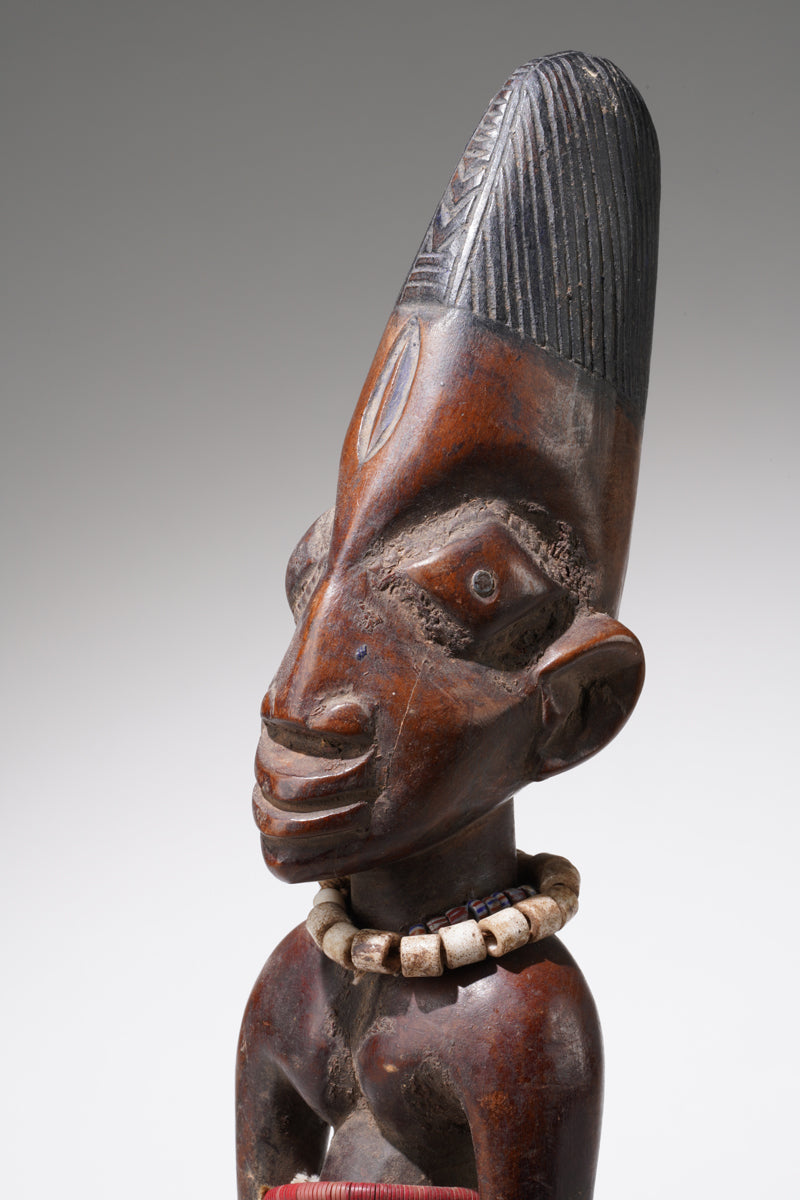 A male Yoruba Ibeji sculpture