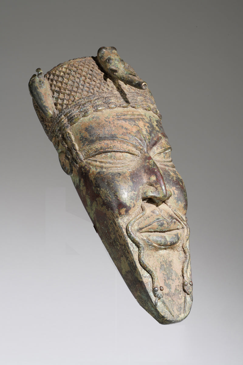 A Yoruba bronze mask