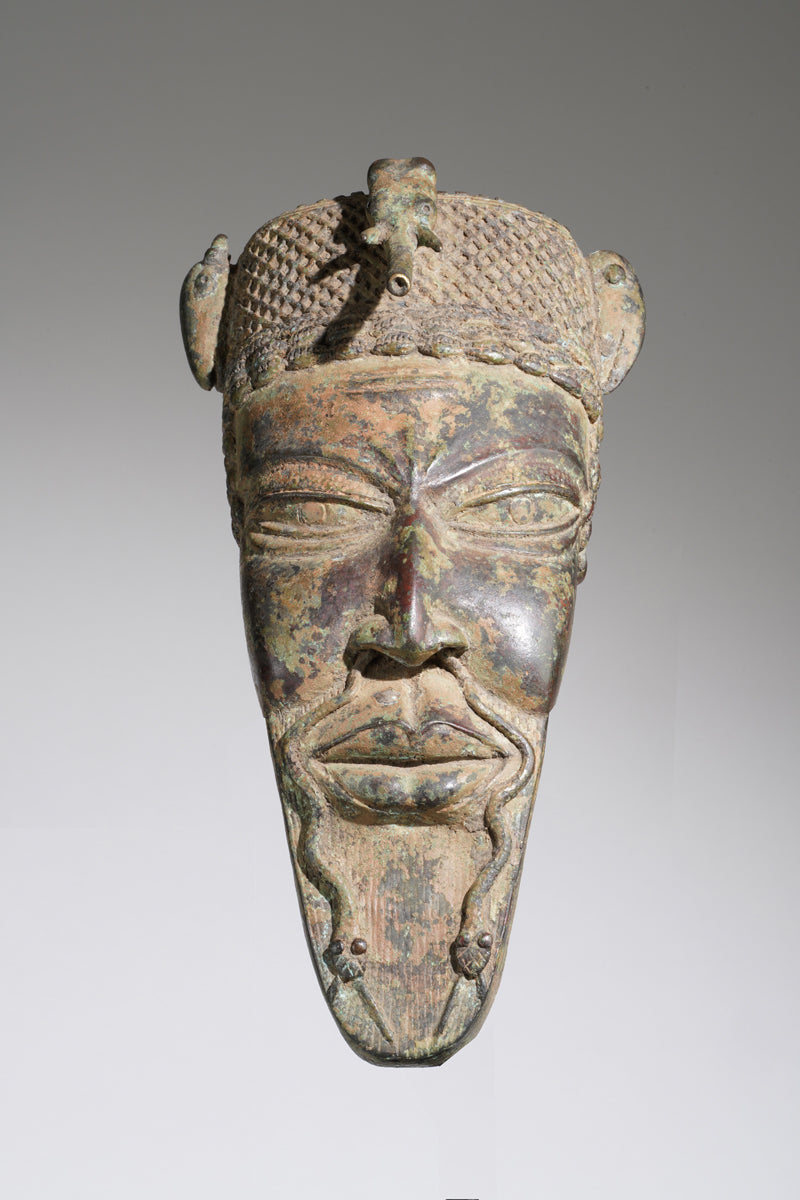 A Yoruba bronze mask