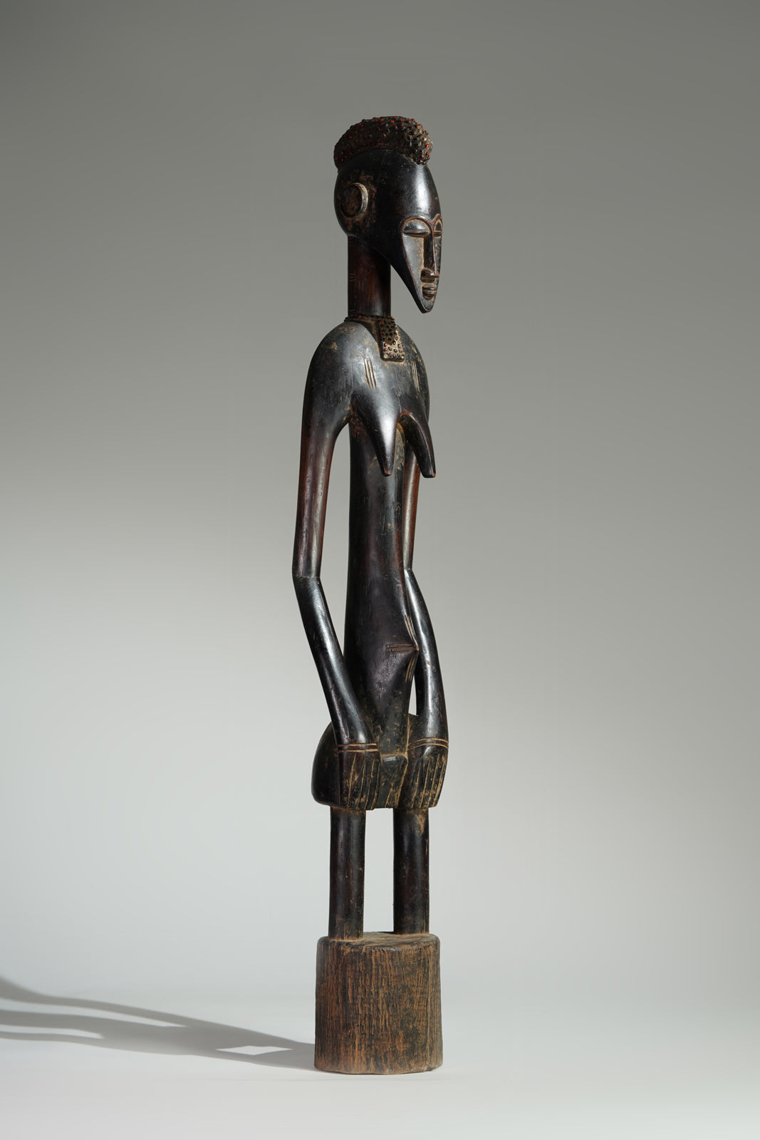 A female Senufo Rhythmpounder (Déblé)