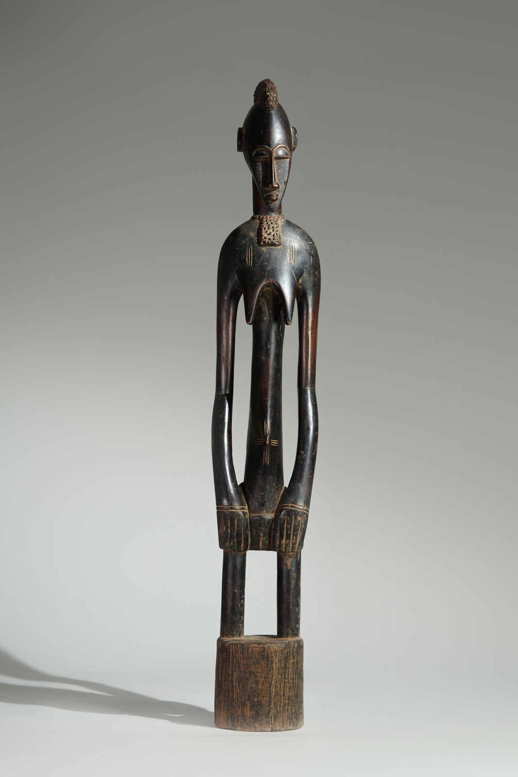 A female Senufo Rhythmpounder (Déblé)