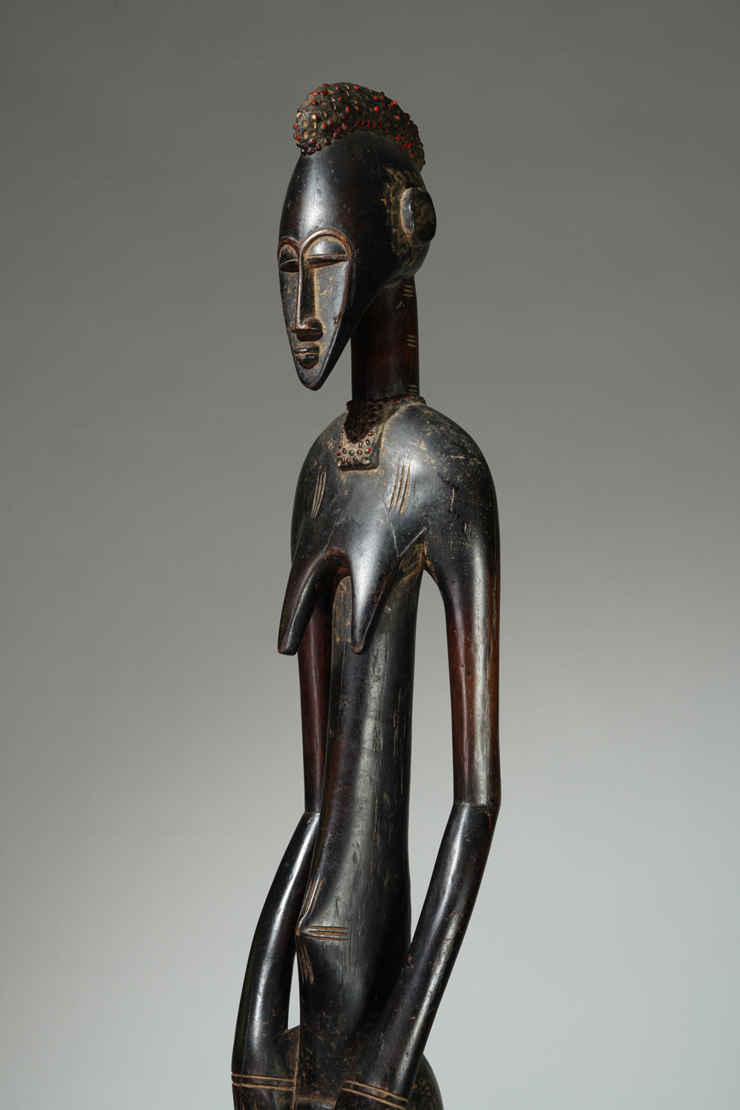A female Senufo Rhythmpounder (Déblé)