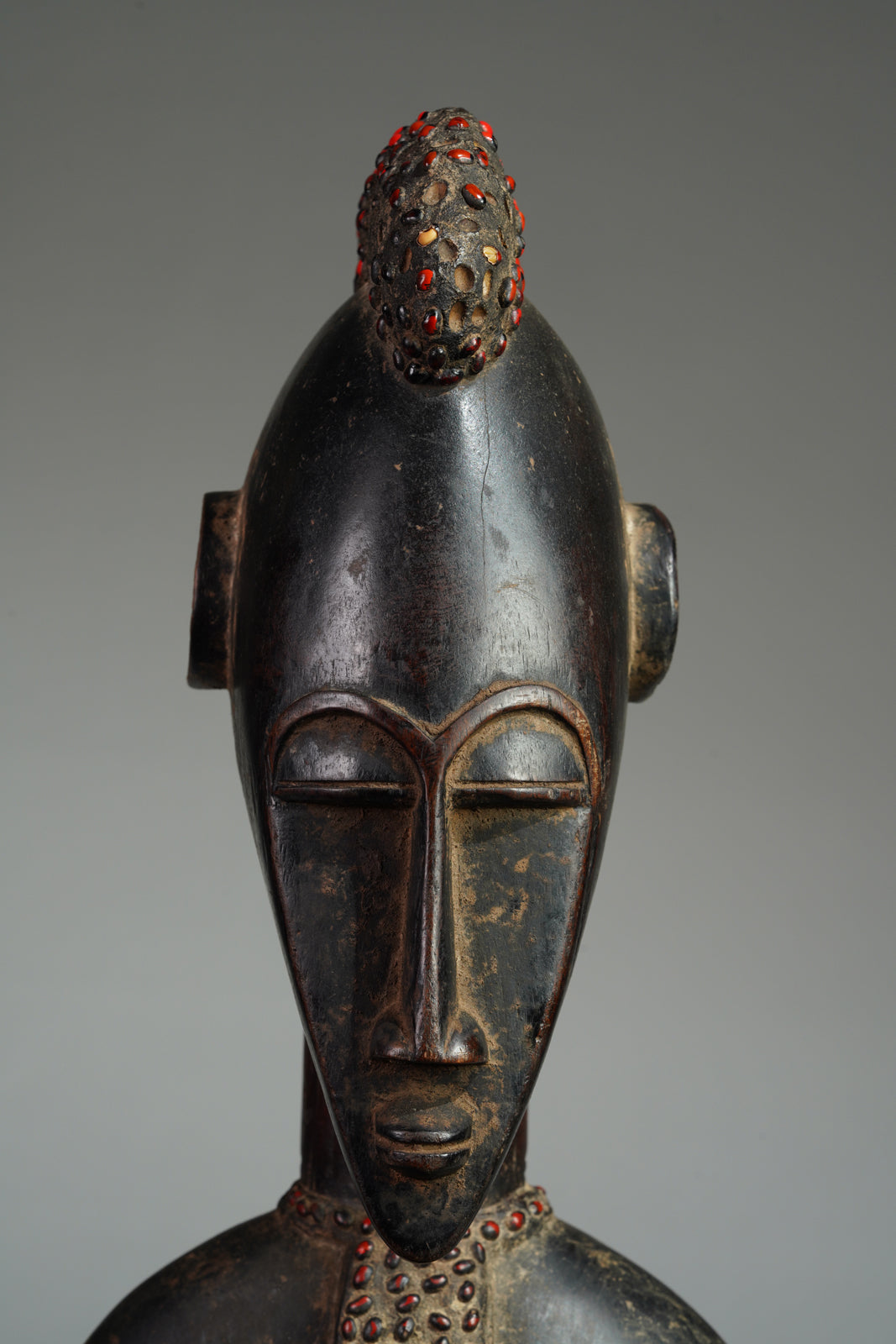 A female Senufo Rhythmpounder (Déblé)