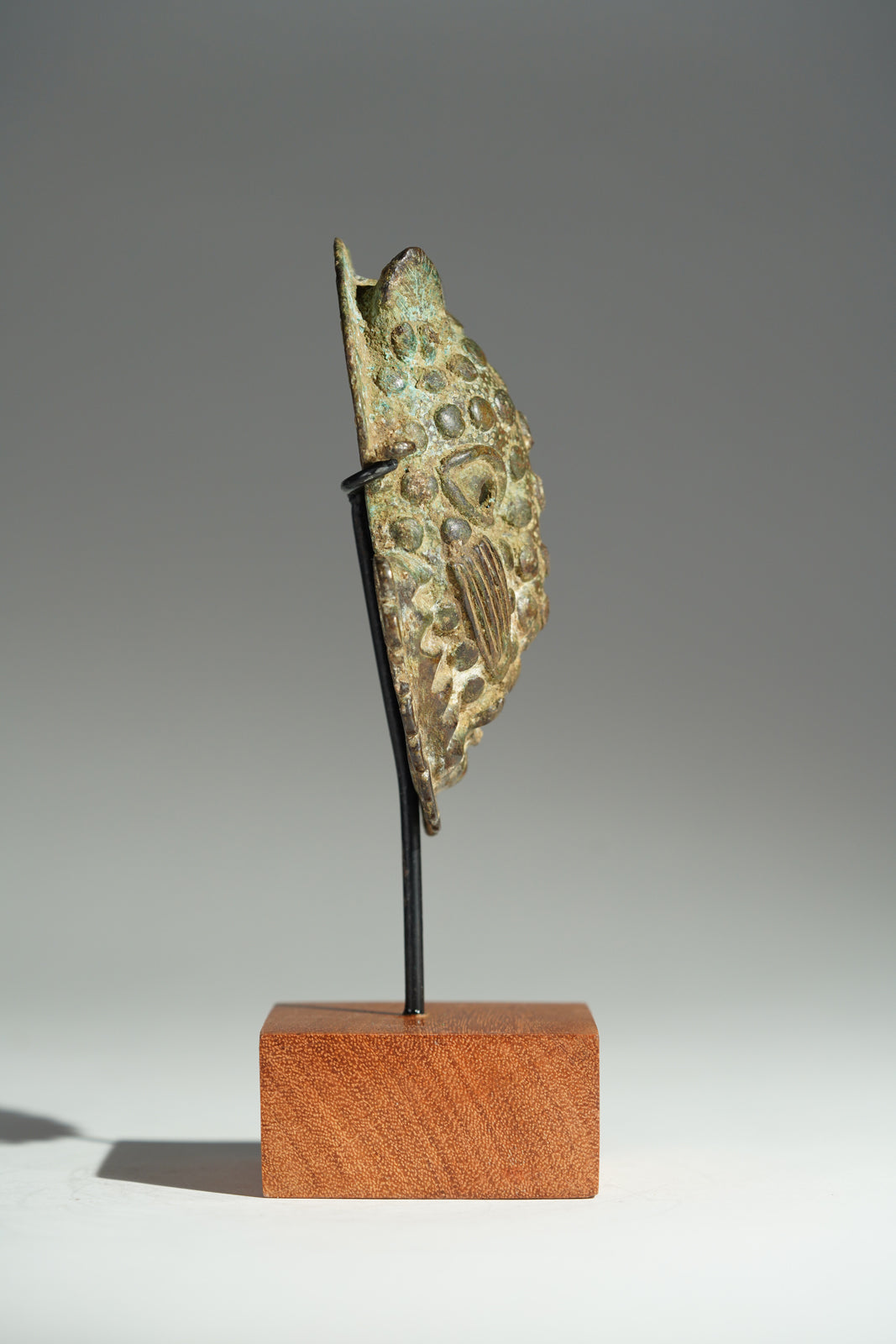 A Benin Bronze hip mask