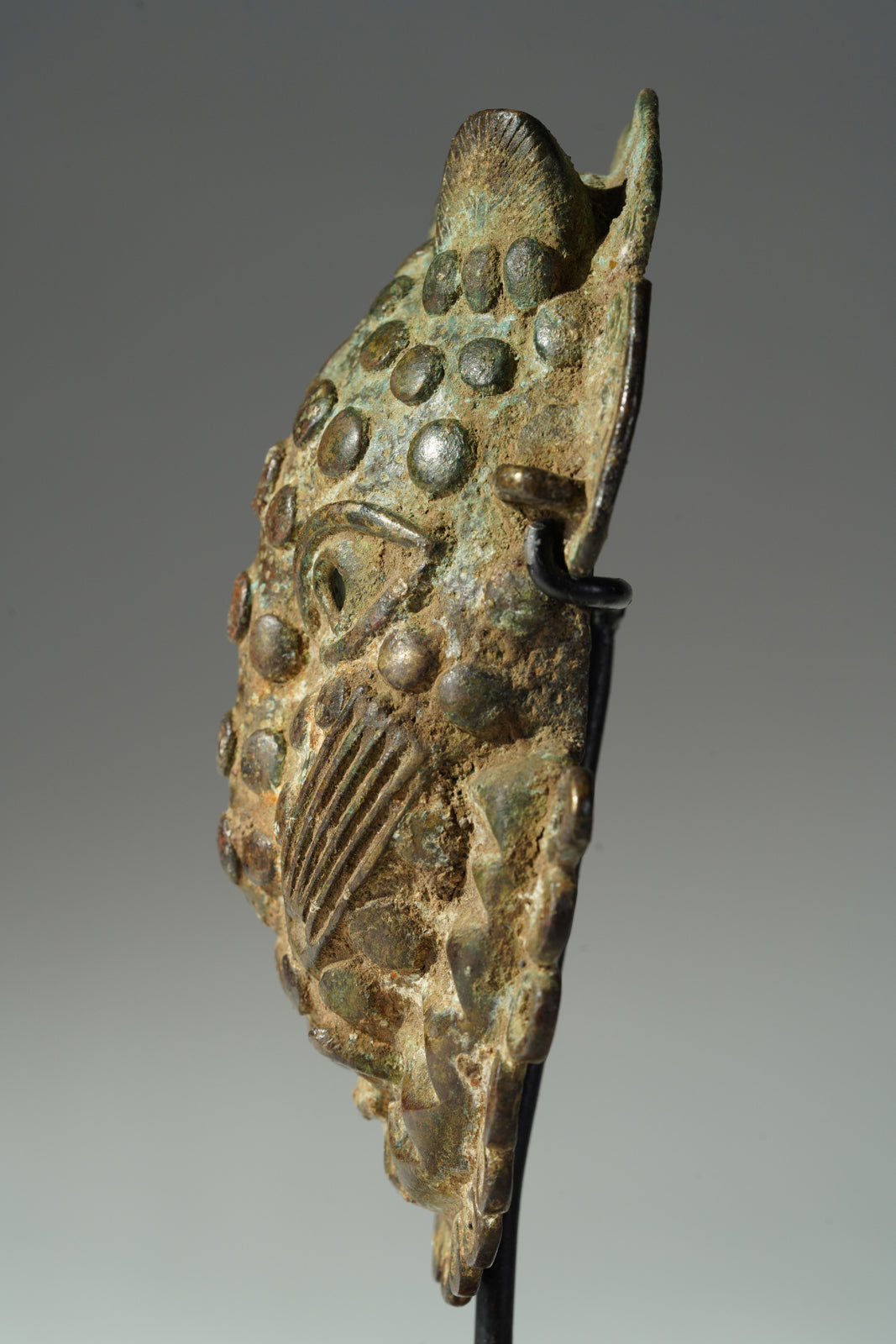 A Benin Bronze hip mask