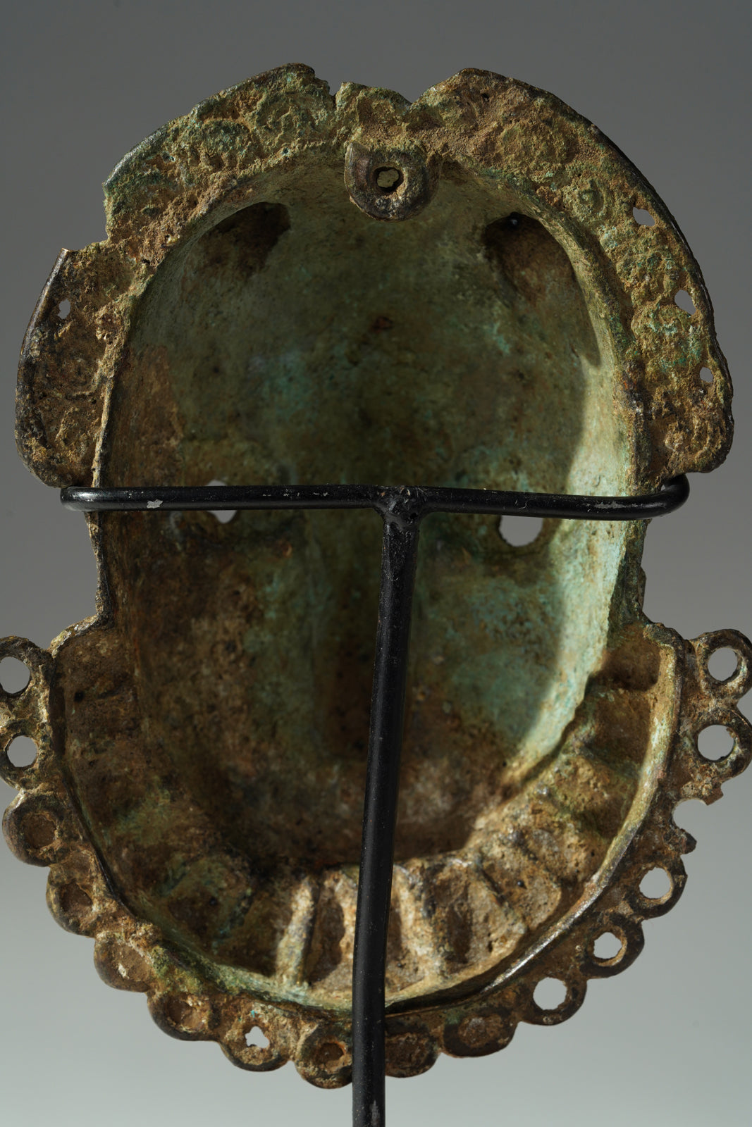 A Benin Bronze hip mask