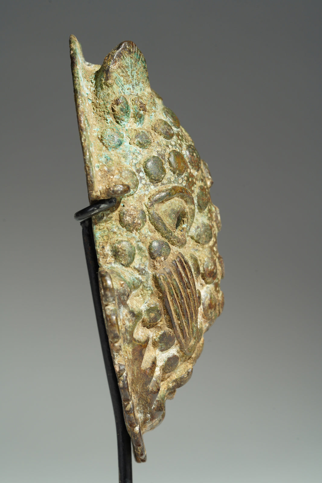 A Benin Bronze hip mask