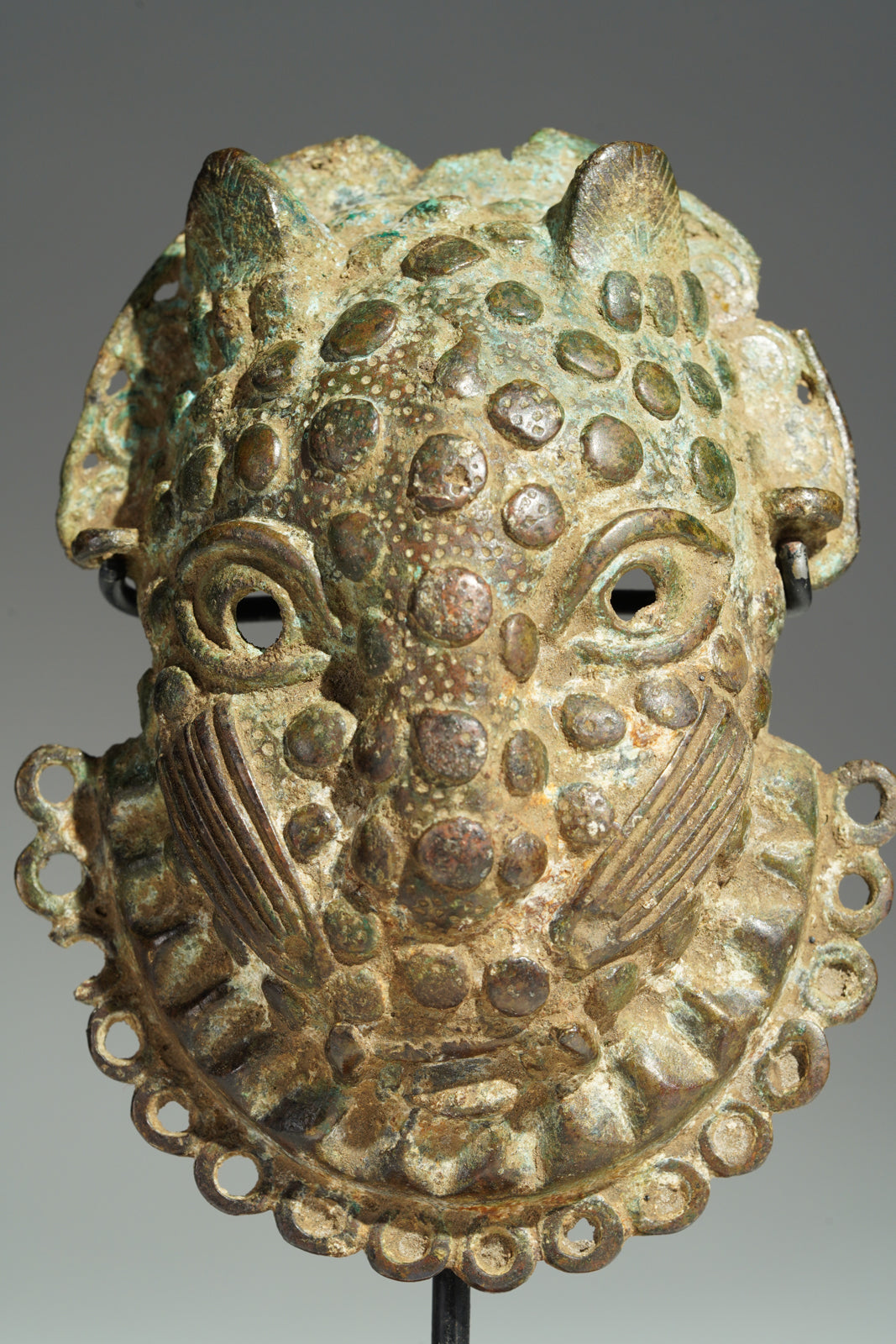 A Benin Bronze hip mask